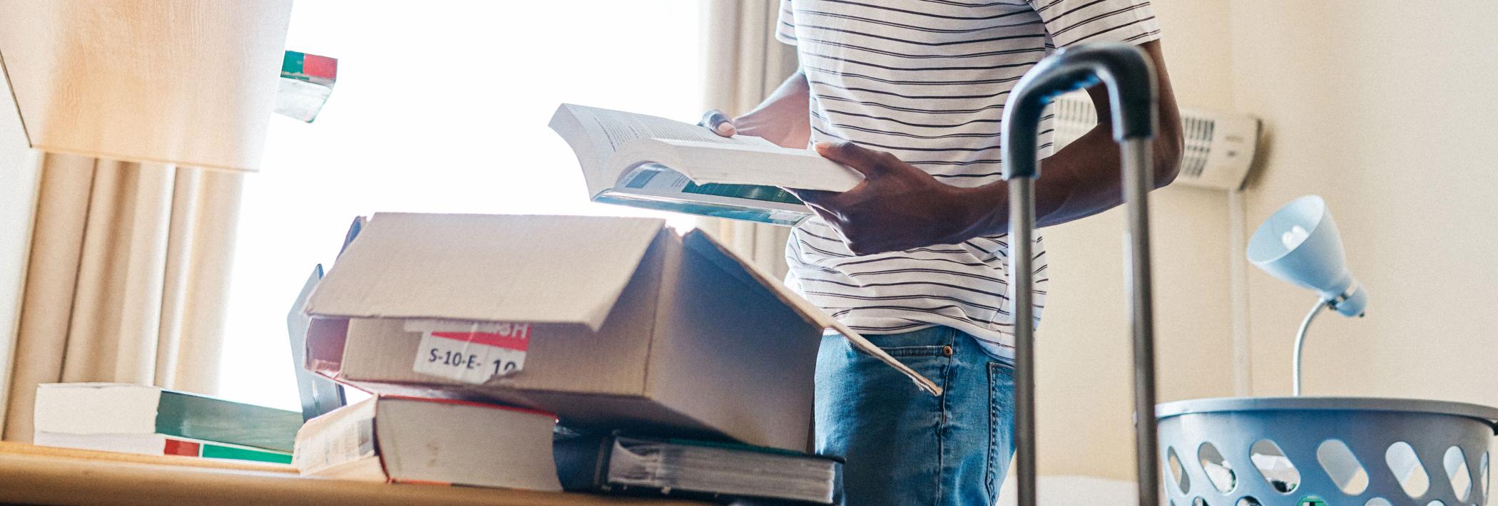 A student packs up their dorm
